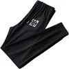 Męskie spodnie Designer Modne Spodnie dla mężczyzn na wiosnę i jesień Nowa wersja koreańska dziewięć części luźne cienkie legginsy 3n9y