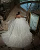 Luxury Ball Gown Wedding Dresses Spaghetti Straps Brudklänningar Pearl Crystal Shiny Sweep Train Vestido de Novia