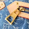 Explosion Frauen neuer Hochhöhen M46837 Denim Blue Denim Canvas Goldfarben Hardware Reißverschlüsse zurück. Pocket D-Ring Abnehmbarer Name Tag Goldenen Stollen Theke mit Box