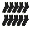 Chaussettes pour hommes Fulsurpris 5pairs / lot de haute qualité pour hommes saisonniers polyvalents élégants d'affaires longs pour hommes tube moyen athlétique