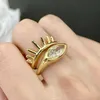 Pierścienie klastra Znakomite złotego koloru pierścienie oka dla kobiet modna sześcienna cyrkonia biżuteria