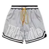 디자이너 Rhude Shorts Mens 메시 짧은 여름 패션 해변 탄성 밴드 바지 남자 고품질 거리 착용 빨간색 블루 블랙 보라색 바지