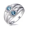 Anelli a grappolo Anello in argento sterling rodiato con topazio blu London