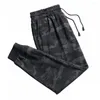 Pantaloni da uomo Autunno Moda Coulisse Camouflage Casual Sport Palestra Pantaloni sportivi larghi Pantaloni da jogging Abbigliamento per uomo