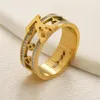 Fashionable and minimalist women's titanium steel 18K gold ring with silver plated plain ring letters