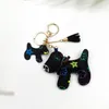 20pcs Tasarımcı Keychain Puppy Gerçek Deri Kolye Anahtar Zinciri Yay Araba Kolye Moda Kişilik Yaratıcı Sevimli Toptan Satış