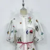 1.9 Holiday vlas bloemenborduurwerk pofmouwen met riem split-shirtjurk met enkele rij knopen dames