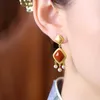 Ohrhänger Ethno-Stil Design „Roter Jade-Rollperlenvorhang“ Südroter Ohrring Damen Goldfarbe China-Chic Kleine Mode Vintage
