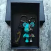 Mechanical Bear Personality CAR BLUKANY DLA MĘŻCZYZN KOBIETA CUTE CARTOON CARDUAL Casual Para Bagband Bag wisząca marka Projektanci prezentu