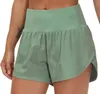 LU-1170 Kvinnors löpande shorts med hög midja yoga snabbtorkande shorts med blixtlåsfickor