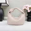 가방 Jodie Bottegaavenetas 2024 Spring and Summer Internet Celebrity Handheld Cloud Cowhorn Bag Fashion Versatile Woven Women 's Fushionable