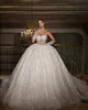 Luxury Ball Gown Wedding Dresses Spaghetti Straps Brudklänningar Pearl Crystal Shiny Sweep Train Vestido de Novia