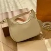 Diseñador Hobo bolso de lujo El nuevo bolso de la axila lienzo de cuero genuino bolso para mujer Cadenas de alta calidad Carteras Bolsos de hombro crossbody