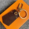 Nouveau Designer Unisexe Noir Porte-clés Accessoires L Porte-clés Lettre De Luxe Modèle De Voiture Porte-clés Bijoux Cadeaux Longes Pour femmes hommes
