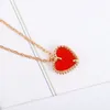 Pendentifs haute Version européenne, bijoux haut de gamme, or Rose, calcédoine rouge, collier en forme de cœur, ensemble de bracelets, mode pour femmes
