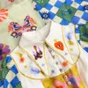 1.9 Vakantie linnen patchwork Ramee bloemenprint lantaarn mouw met riem enkele rij knopen verzamelen taille lange jurk dames