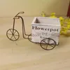 Planters POTS Fashion Iron-Wheel Flower Pot Antik trä Planter Flower Pot Moverble Gardening Bike Flower Pot For Home Yard Garden Decoration YQ240109