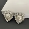 Kolczyki Dangle Fashion Europe Słynna marka projektantka Pearl Heart Crystal Ear Clip Big Woman luksusowe biżuterię trend pasa startowego