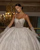 Luxury Ball Gown Wedding Dresses Spaghetti Straps Brudklänningar Pearl Crystal Shiny Sweep Train Vestido de Novia