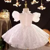 Abiti da ragazza Glitter bianchi applique al ginocchio piume abito a fiori per matrimonio elegante prima festa di compleanno eucaristica per bambini