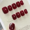 Unghie finte Armatura di poterapia giapponese fatta a mano che indossa adesivi per unghie finti rosso scuro L'arte regala agli amici una serie di stile minimalista e cool