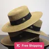 Designer Ball Caps Spring and summer golden woven straw hat little bee lady's fashionable wide brim sunscreen flat hat for travel AXKO