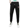 Homens Tracksuits Designer Verão Nova Marca de Moda Luz Luxo High-End Calças Esportivas Masculinas Tendência Versátil Leggings Europeias Casuais 54ZK