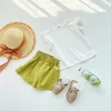Conjuntos de roupas para meninas verão camiseta de manga curta com shorts de cintura de botão de flor conjunto de duas peças terno de cor doce
