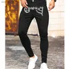 Jeans masculin Fashion Black Stretch Slim Fit Hole Black Fit Hot Drilling Designer punk pantalon Streetwear Denim Rignestone Pantal