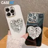 Caseist Luxury Electropated Phone Case With Heart Diamond Holder Glitter 3D Rhinestone Stand Women Gift glittrande TPU -omslag för iPhone 15 14 13 12 11 Pro Max XS 8 7 Plus