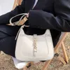 Axelväskor delar tillbehör underarmsida lyxmärke plånböcker och handväskor designer läder crossbody för womencatlin_fashion_bags