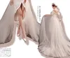 Abiti da sposa hi-lo in tulle con scollo a cuore Abito da sposa con strascico di corte con fiocco