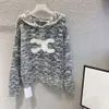 セリンヌのセーターデザイナーファッション女性の刺繍スノーフレークフード付きプルオーバー長袖秋/冬の新しいファッション汎用性のあるニットウェア