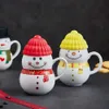Mugs Christmas And New Year Ceramic Snowman Mug Creative Cartoon Household Coffee Milk Tea Cute Gift With Lid Tableware Multicolor YQ240109