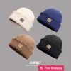 Designer Ball Caps Marque tendance MIN chapeau tricoté perforé pour les femmes polyvalent pour l'automne et l'hiver chapeau de laine chaud pour les couples propriétaire chapeau froid en peau de melon pour les hommes