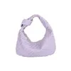 가방 Jodie Bottegaavenetas 2024 Spring and Summer Internet Celebrity Handheld Cloud Cowhorn Bag Fashion Versatile Woven Women 's Fushionable