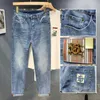 Mäns jeansdesigner Hong Kong trendiga varumärke jeans för mäns high-end koreanska elastiska smala passform, fashionabla och mångsidiga avslappnade långa byxor w0ih