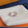 مع صندوق مصمم أزياء مربع للنساء ارتباطات حلقات فضية من التيتانيوم للمجوهرات النسائية الرفاهية الحب مطلي بالرسالة