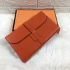 Portefeuilles de marque de luxe Porte-cartes Togo Designer Purse Passport Sacs mode peau de vache Portefeuille en cuir véritable pour hommes femme Long sacs à main