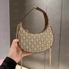 Designer hoge kwaliteit halvemaanvormige mini-tas echt leer dames crossbody met in elkaar grijpende luxe mode veelzijdige duurzame messenger-tassen handtassen