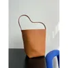 Radens hinkväska är enkel fast färg bärbar en axel stor kapacitet och elegant för pendling av hög kvalitet