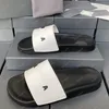 2024 Fashion Boy Pool Slides Sliders de pantoufles de créateurs Paris sandales pantoufles pour hommes femmes Hot unisexe piscine tongs de plage avec boîte taille 35-46