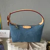 Bolso de mezclilla bolso de mano vintage Bag de cintura Bolso de hombro Bolsas para mujeres Bolsas para peluquería de lienzo Bag antigua Bolsa de axilas impresas Mochila mochila Gold Hardware 46203 468