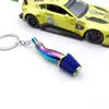 Fashion metal designer Keychain modified car Glitz plating process Car shift hub Turbo shock absorber model Mini keychain