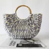 Totes 2023 Summer New Bamboo Handle Blue White Grass Woven Bag Round Dou Beach Handheld Women's Shoulder bagcatlin_fashion_bags