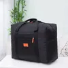 Borsa da viaggio pieghevole ad alta capacità Borsa da viaggio impermeabile in nylon Borsa per vestiti a mano Organizzatore per uomini e donne Cubo da viaggio per imballaggio 240109