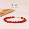 Armband naturligt rött agatarmband kvinnlig stil temperament i år student gåva avancerade smycken trasiga tai sui lockar rikedom