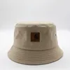 2020 TOOLERING Kort randen Fisherman's Hat Folding Flat Top Leather Label Basin Hat Hip Hop Sun Hat