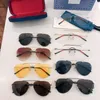 Óculos de sol com armação de metal oval projetados pelo designer para óculos de sol de pesca ao ar livre na moda, óculos de sol de alta qualidade para homens e mulheres GG0397S
