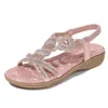 Mode kvinnor platt casual kilar sandaler parti diamanter gladiator sommarskor flickor låga klackar sandalias mujer feminina 545